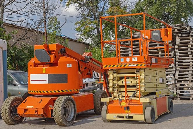 forklift transporting goods in a busy warehouse setting in Bucoda, WA